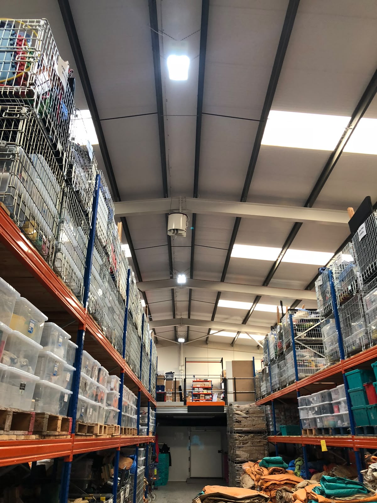 Corridor with continuous recessed downlighting and matched wall sockets — commercial electrical installation by D.P.L Electrical Services