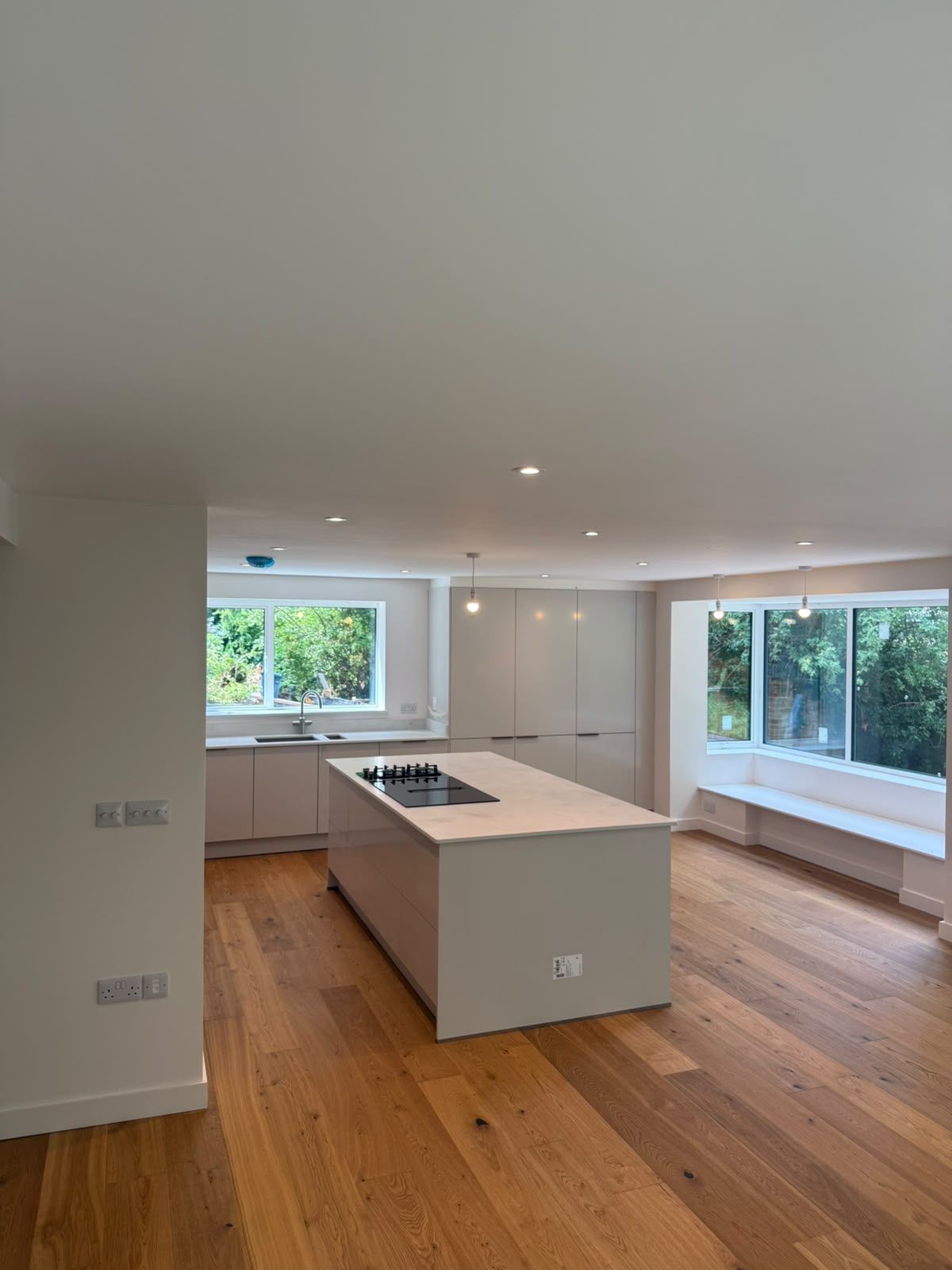 Labelled Oven 2 isolator and Microwave fused spur switches — bespoke kitchen electrical installation by D.P.L Electrical Services