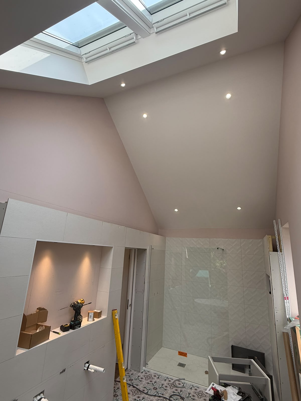 Loft bathroom with recessed downlights and skylight wall niche spotlights — new-build electrical fit-out by D.P.L Electrical Services